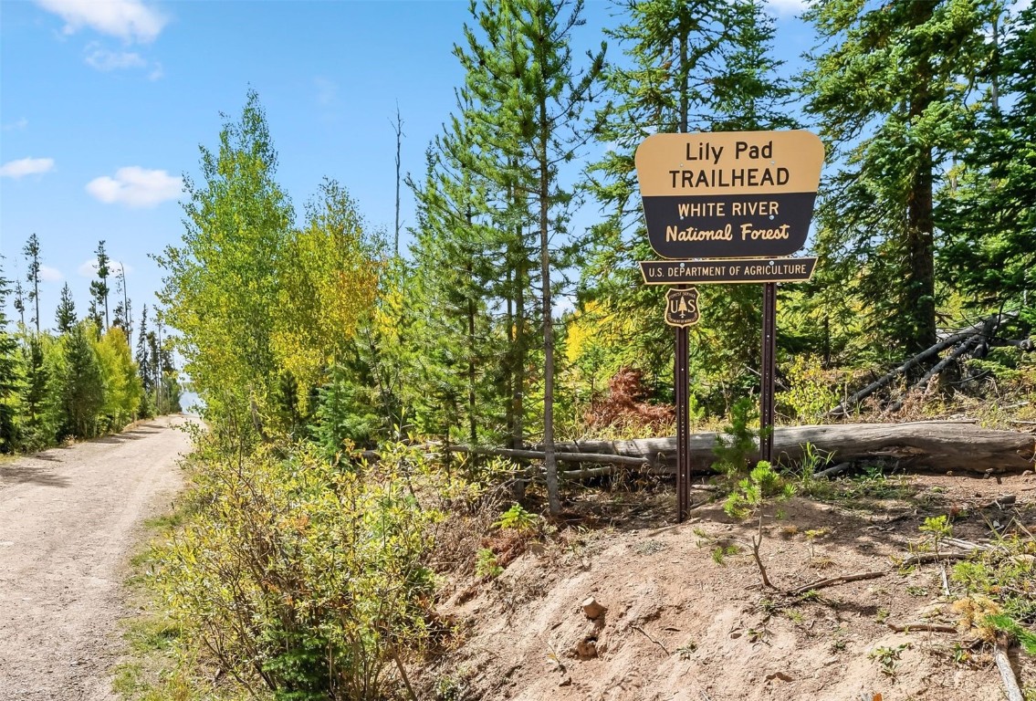 9849 Ryan Gulch Road, Unit 203 Silverthorne, CO 80498 - Photo 29 of 35 a sign that is sitting on a brick wall