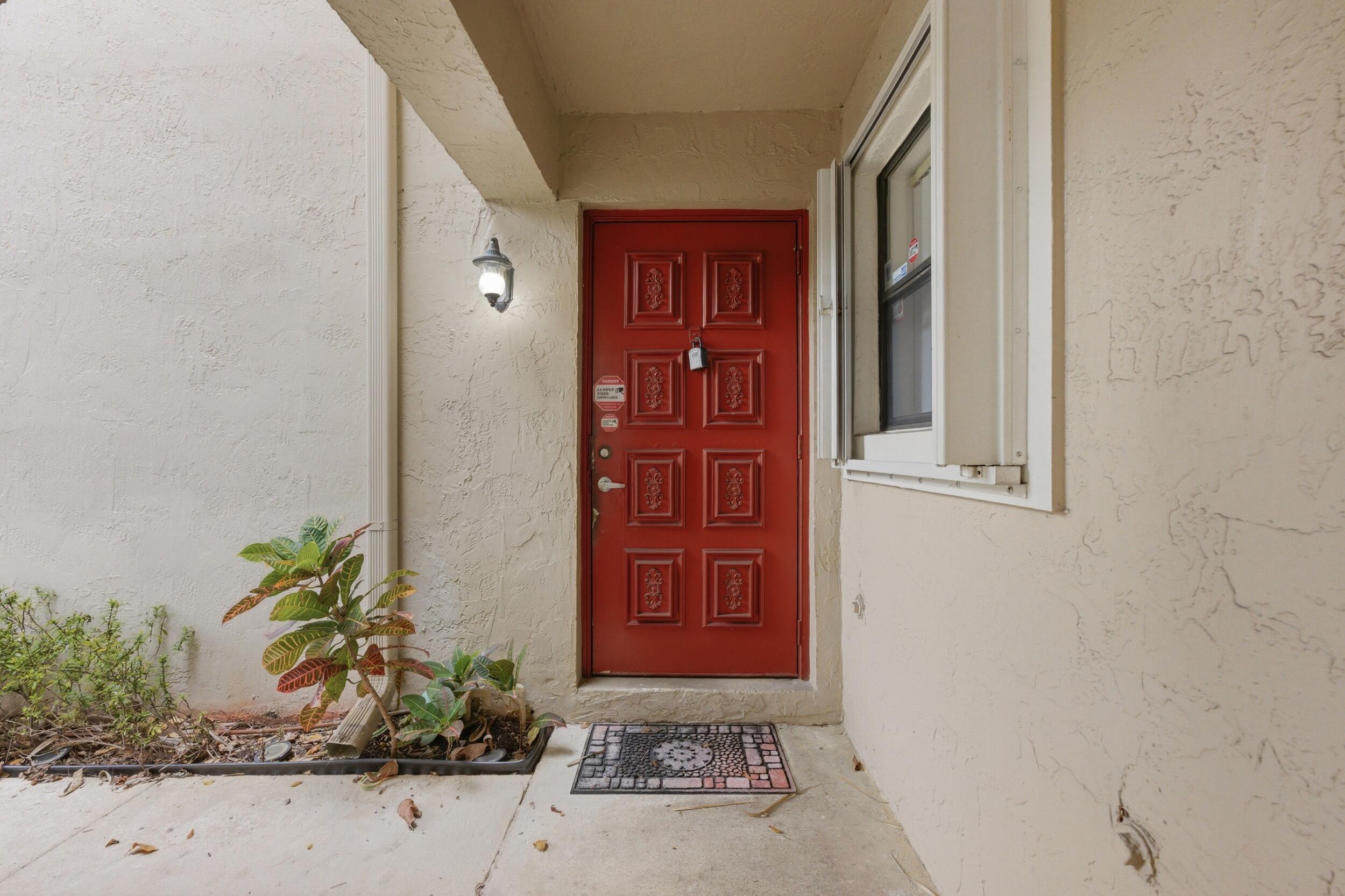 9633 Riverside Drive, Unit E3 Coral Springs, FL 33071 - Photo 3 of 31 a front view of a house