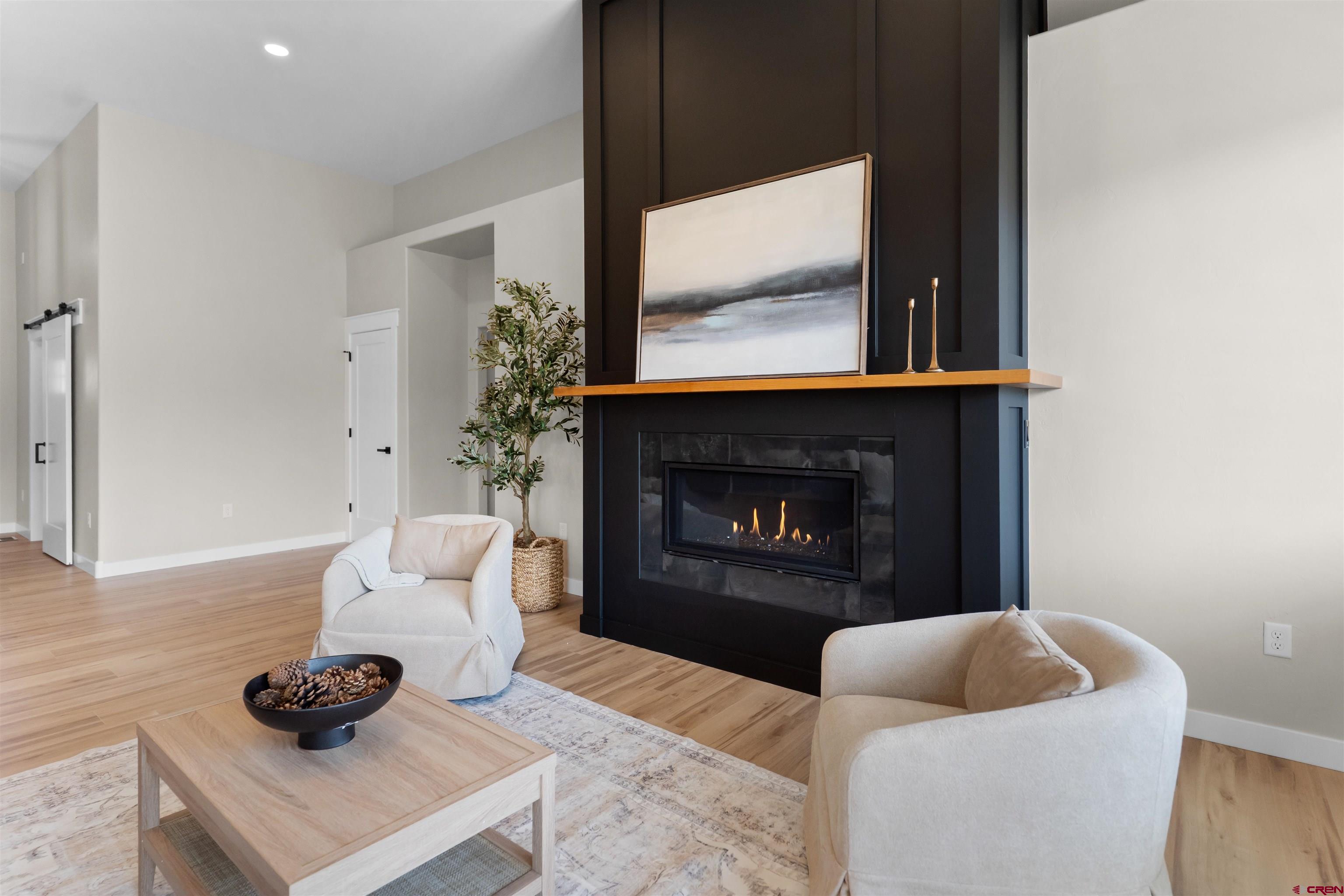 1539 Criterion Street Delta, CO 81416 - Photo 13 of 41 a living room with furniture and a fireplace