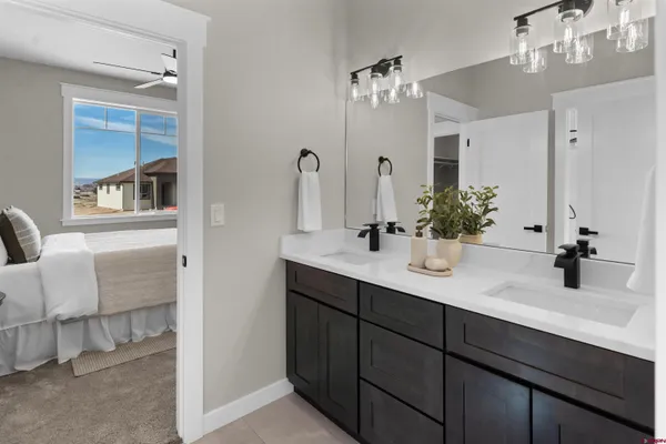 a picture of a bathroom with a shower