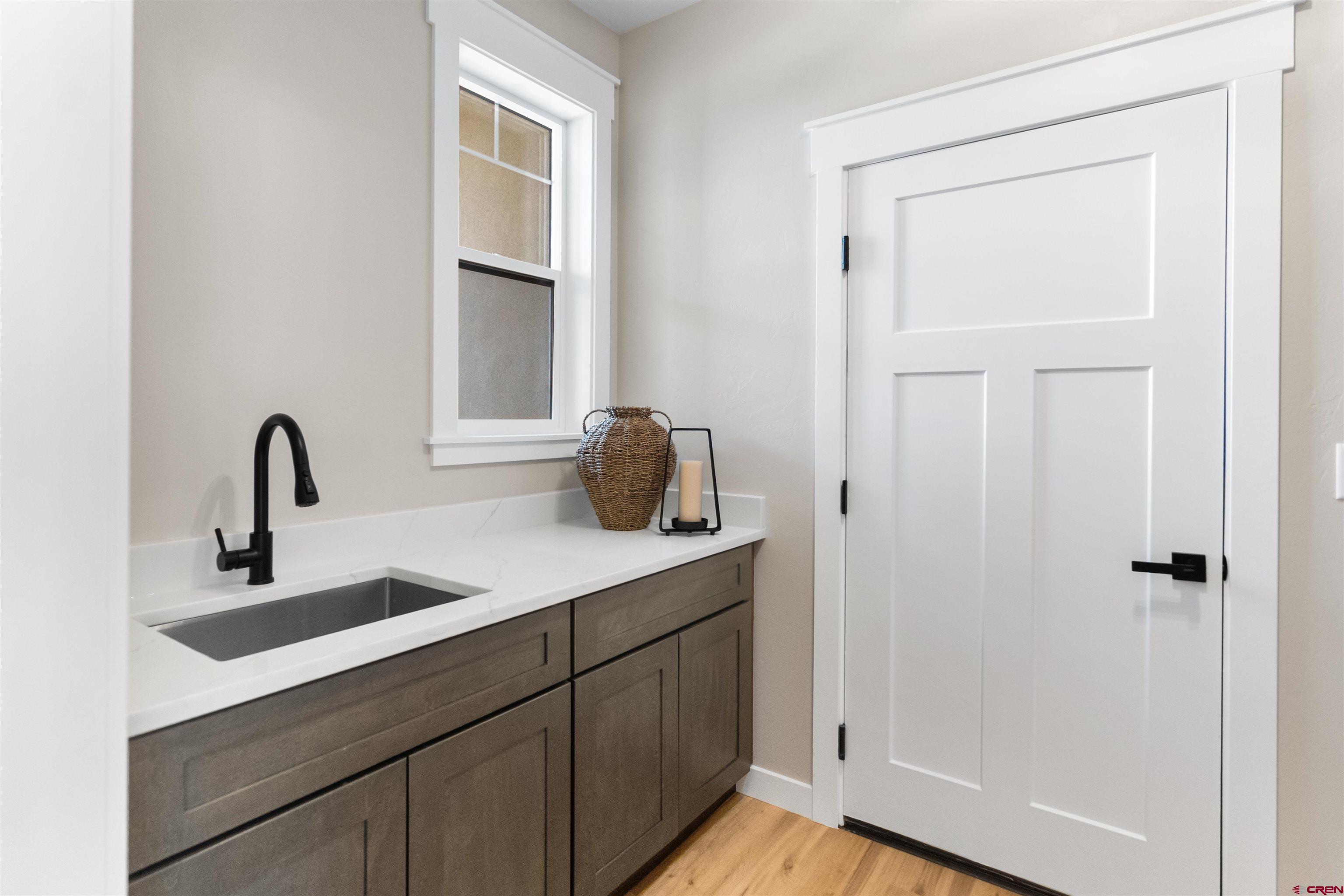 1539 Criterion Street Delta, CO 81416 - Photo 27 of 41 a kitchen with a sink and a window