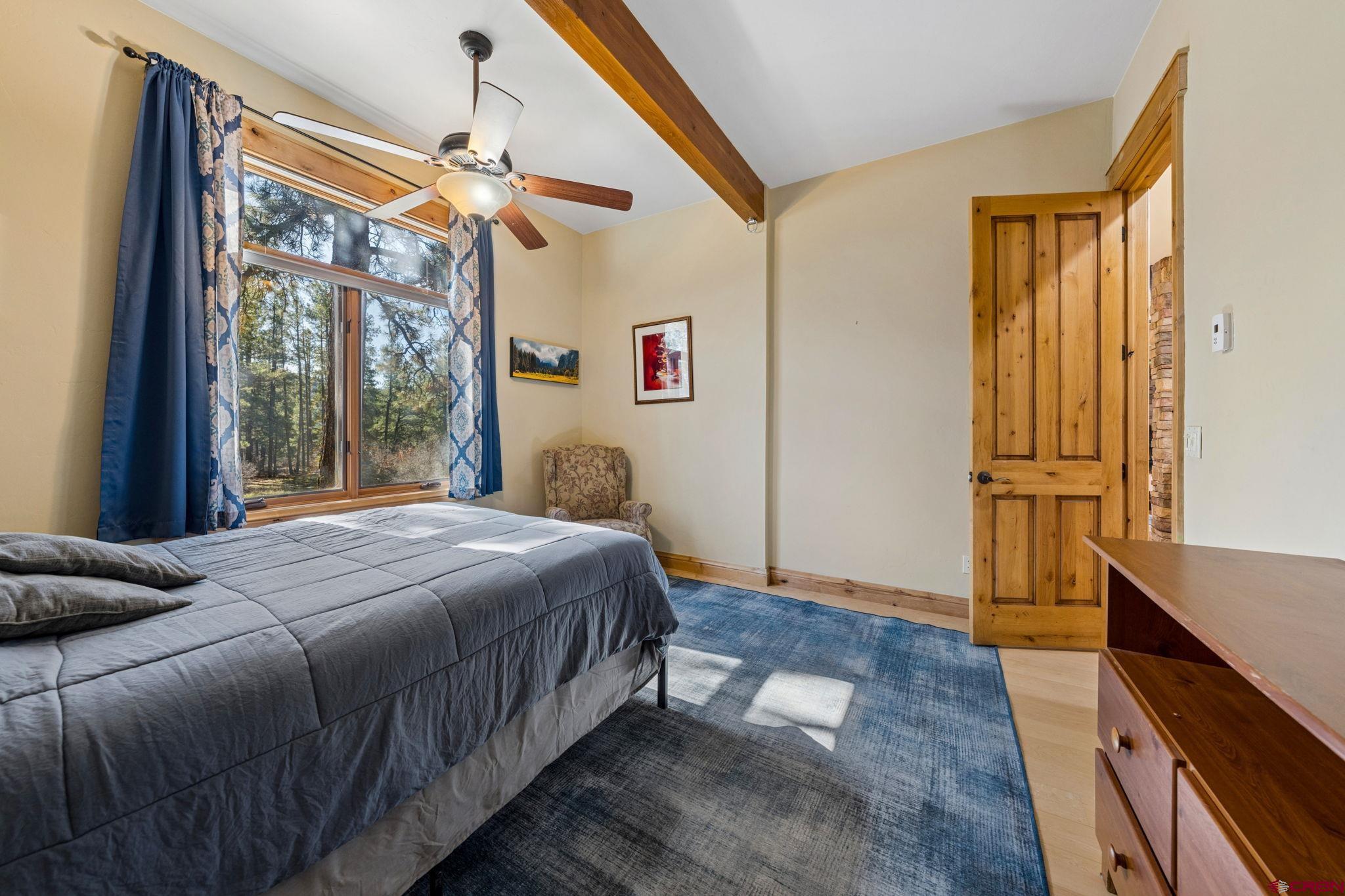 70 Clear Creek Loop Durango, CO 81301 - Photo 20 of 35 a bedroom with a bed and a dresser
