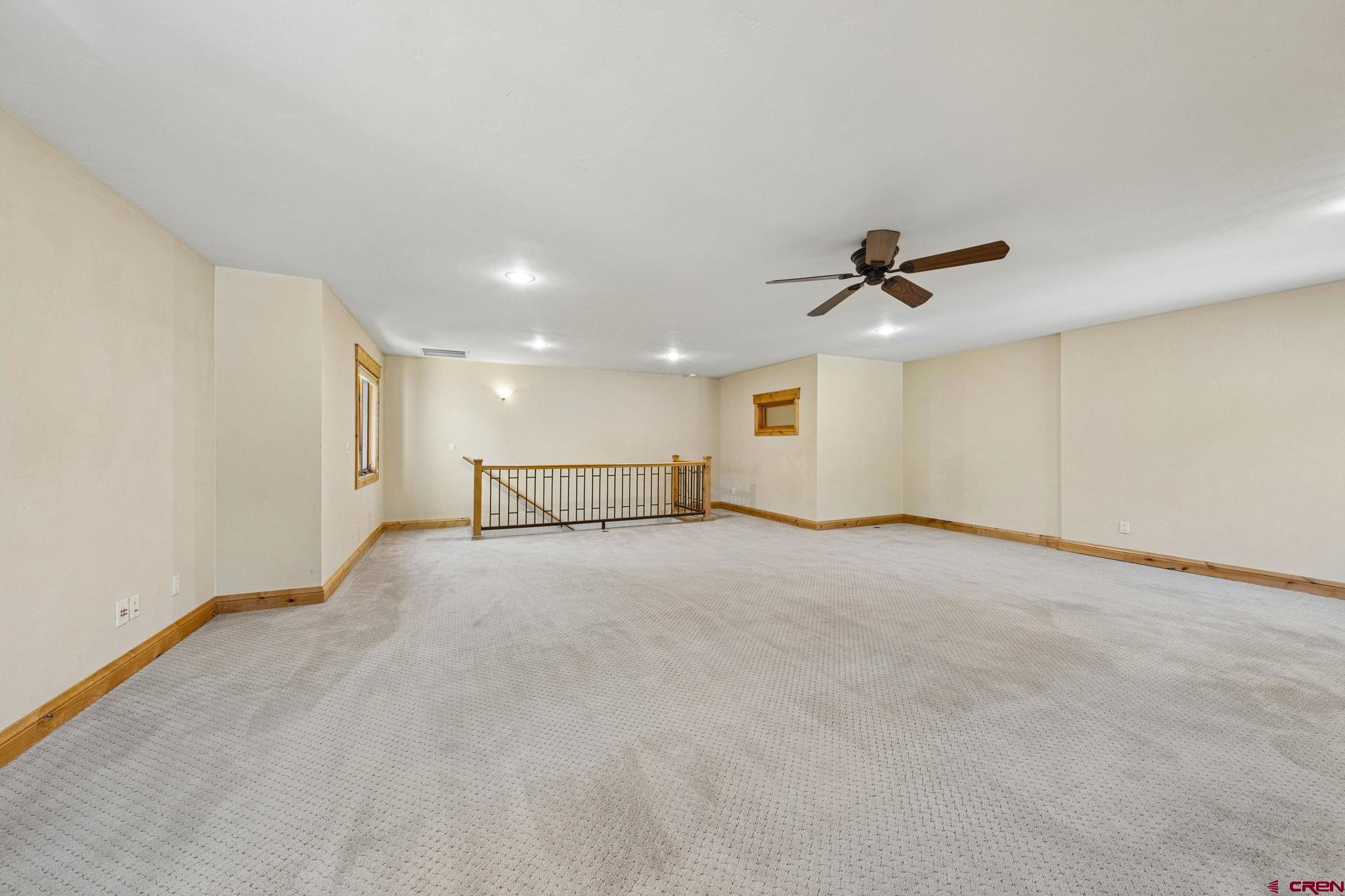 70 Clear Creek Loop Durango, CO 81301 - Photo 23 of 35 a view of a livingroom with a ceiling fan and window