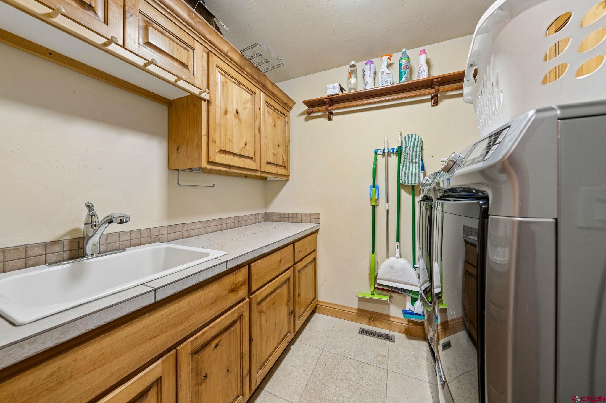 70 Clear Creek Loop Durango, CO 81301 - Photo 25 of 35 a bathroom with a sink and mirror