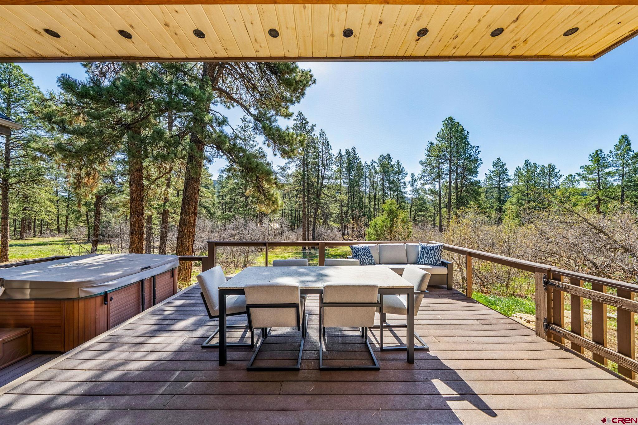 70 Clear Creek Loop Durango, CO 81301 - Photo 26 of 35 a balcony with wooden floor table and chairs