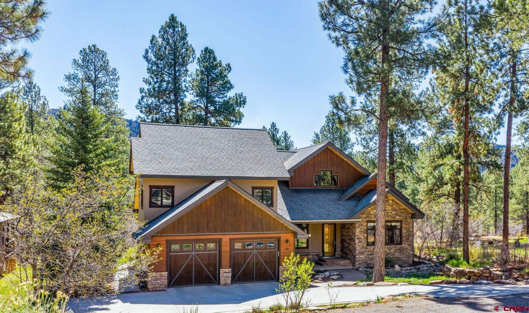 70 Clear Creek Loop Durango, CO 81301 - Photo 34 of 35 a front view of a house with a yard