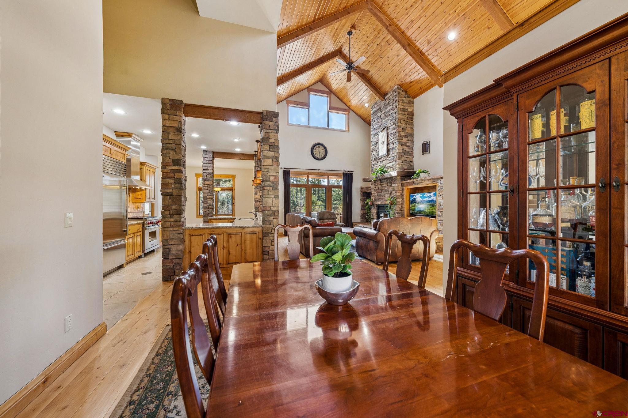 70 Clear Creek Loop Durango, CO 81301 - Photo 6 of 35 a view of a dining room with furniture window and wooden floor