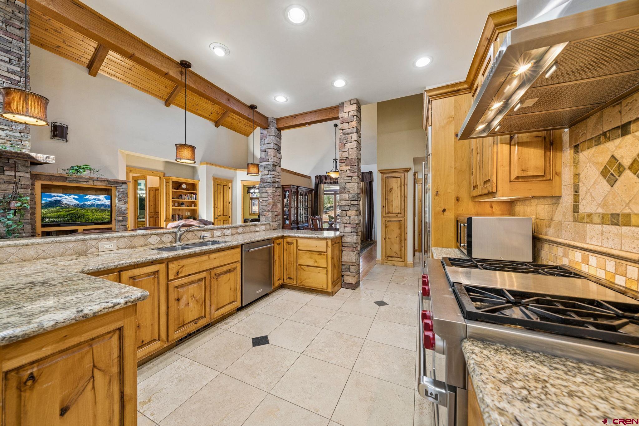 70 Clear Creek Loop Durango, CO 81301 - Photo 7 of 35 a kitchen with stainless steel appliances granite countertop a stove and a sink
