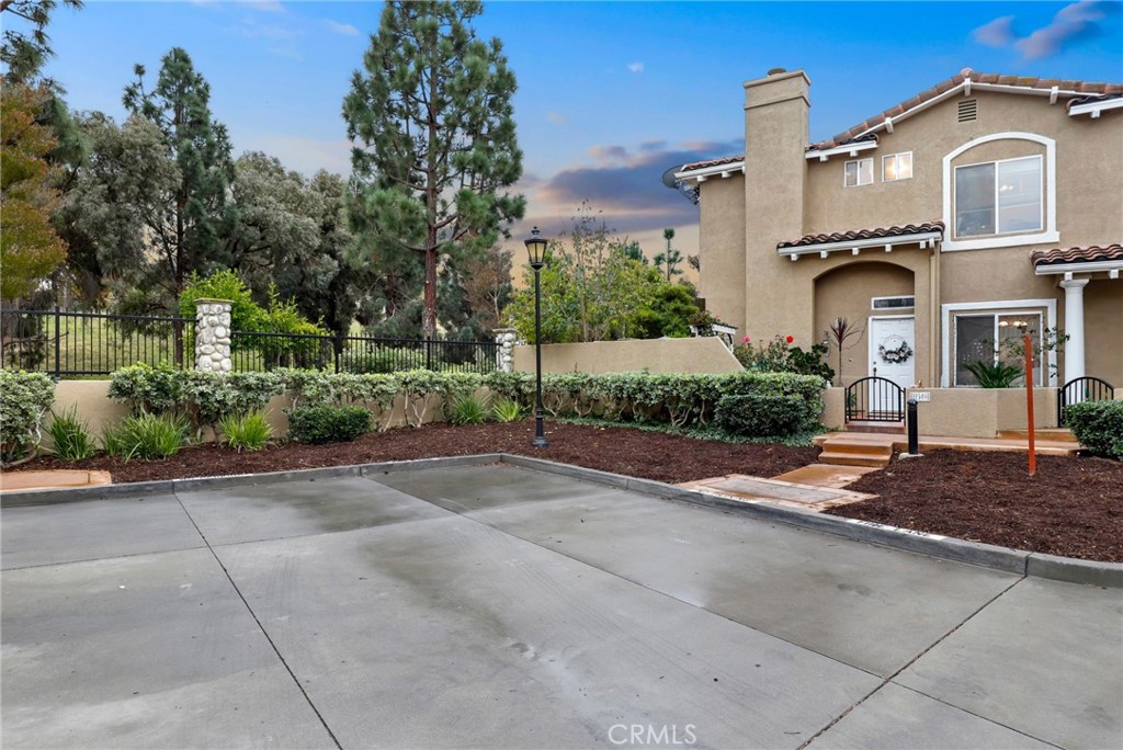 11549 Treeview Court Moorpark, CA 93021 - Photo 1 of 1 a front view of a house with a yard and garage