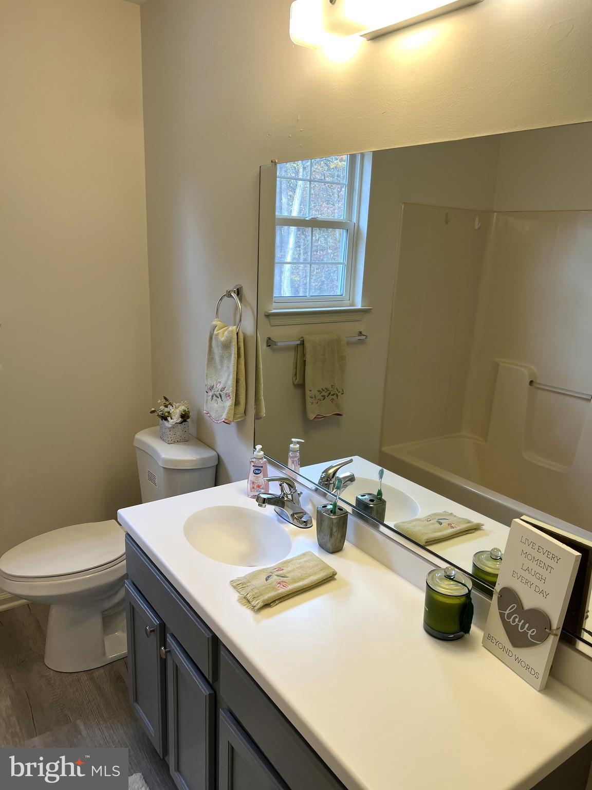 560 South Pitney Road Galloway Township, NJ 08205 - Photo 14 of 34 a bathroom with a sink and a toilet