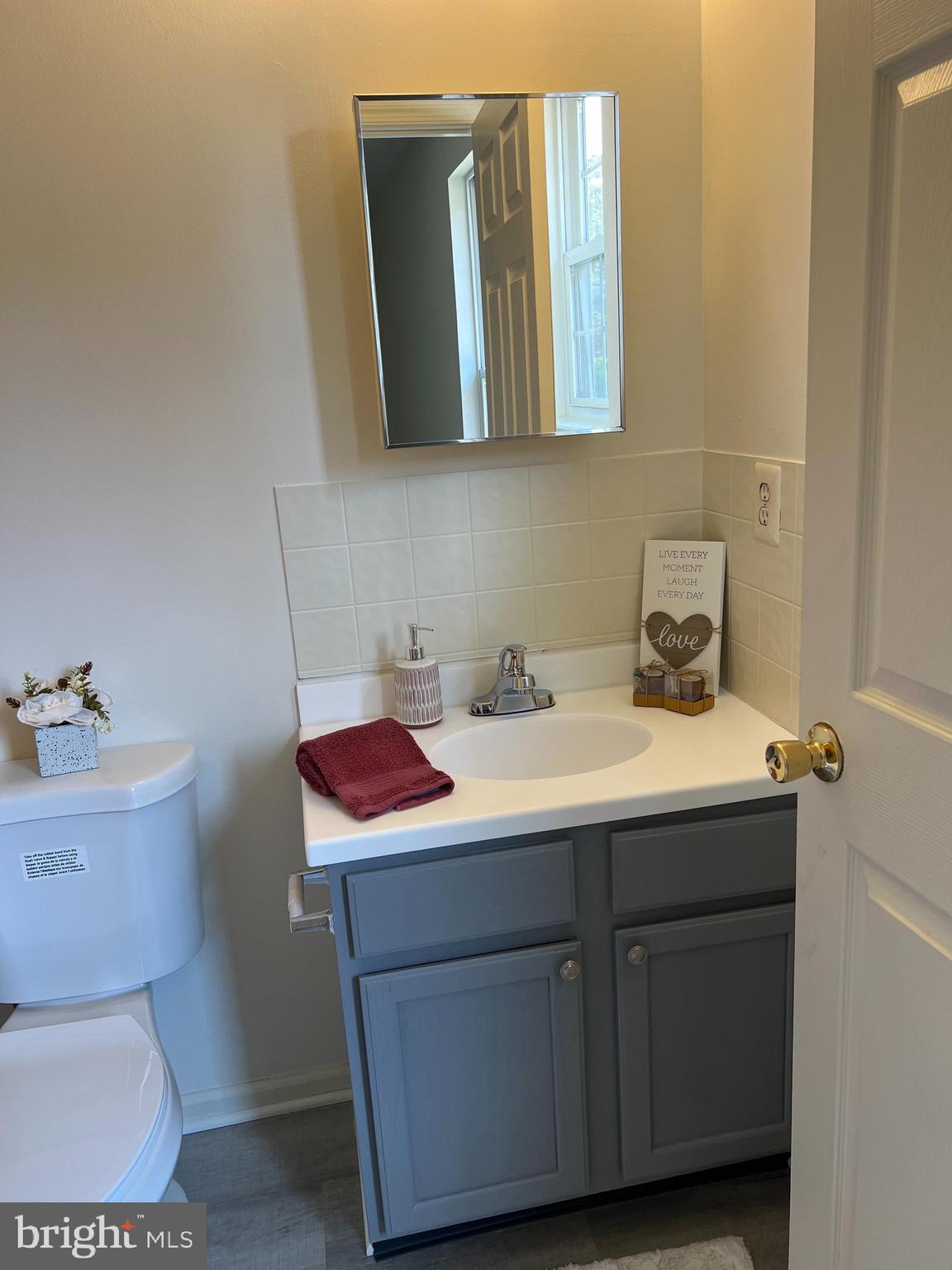 560 South Pitney Road Galloway Township, NJ 08205 - Photo 24 of 34 a bathroom with a sink and a mirror