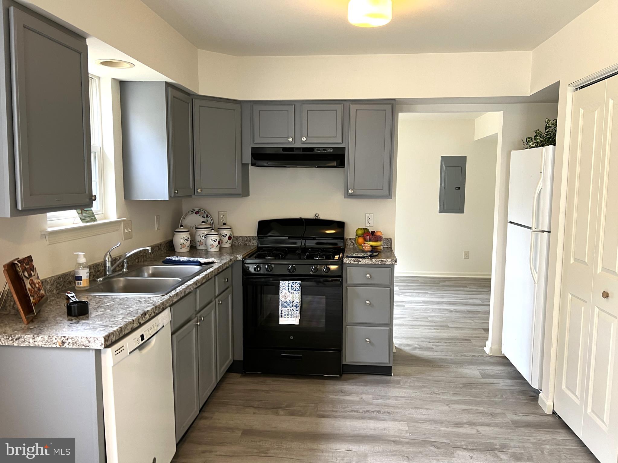 560 South Pitney Road Galloway Township, NJ 08205 - Photo 4 of 34 a kitchen with stainless steel appliances granite countertop a stove a sink and a refrigerator