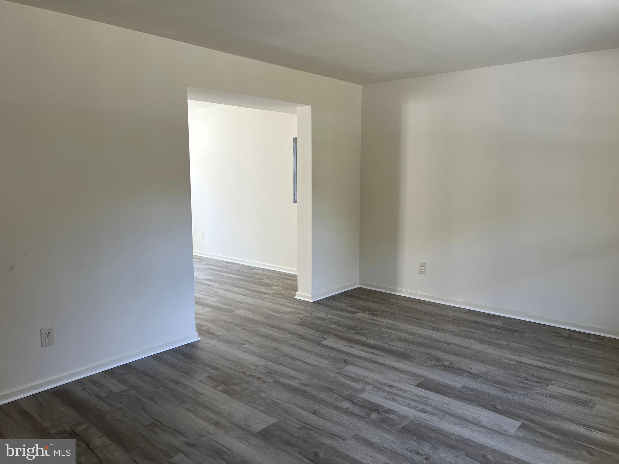 560 South Pitney Road Galloway Township, NJ 08205 - Photo 7 of 34 a view of an empty room with wooden floor