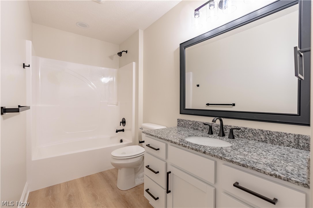7876 Burkey Road Northwest North Canton, OH 44720 - Photo 26 of 40 Hall bathroom on the second floor with a tub/shower combo.