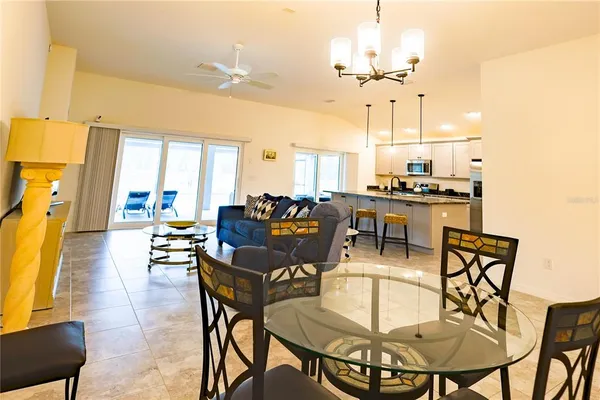 a view of a dining room with furniture window and outside view