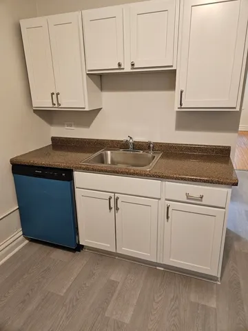 a view of a room with rack on the wall