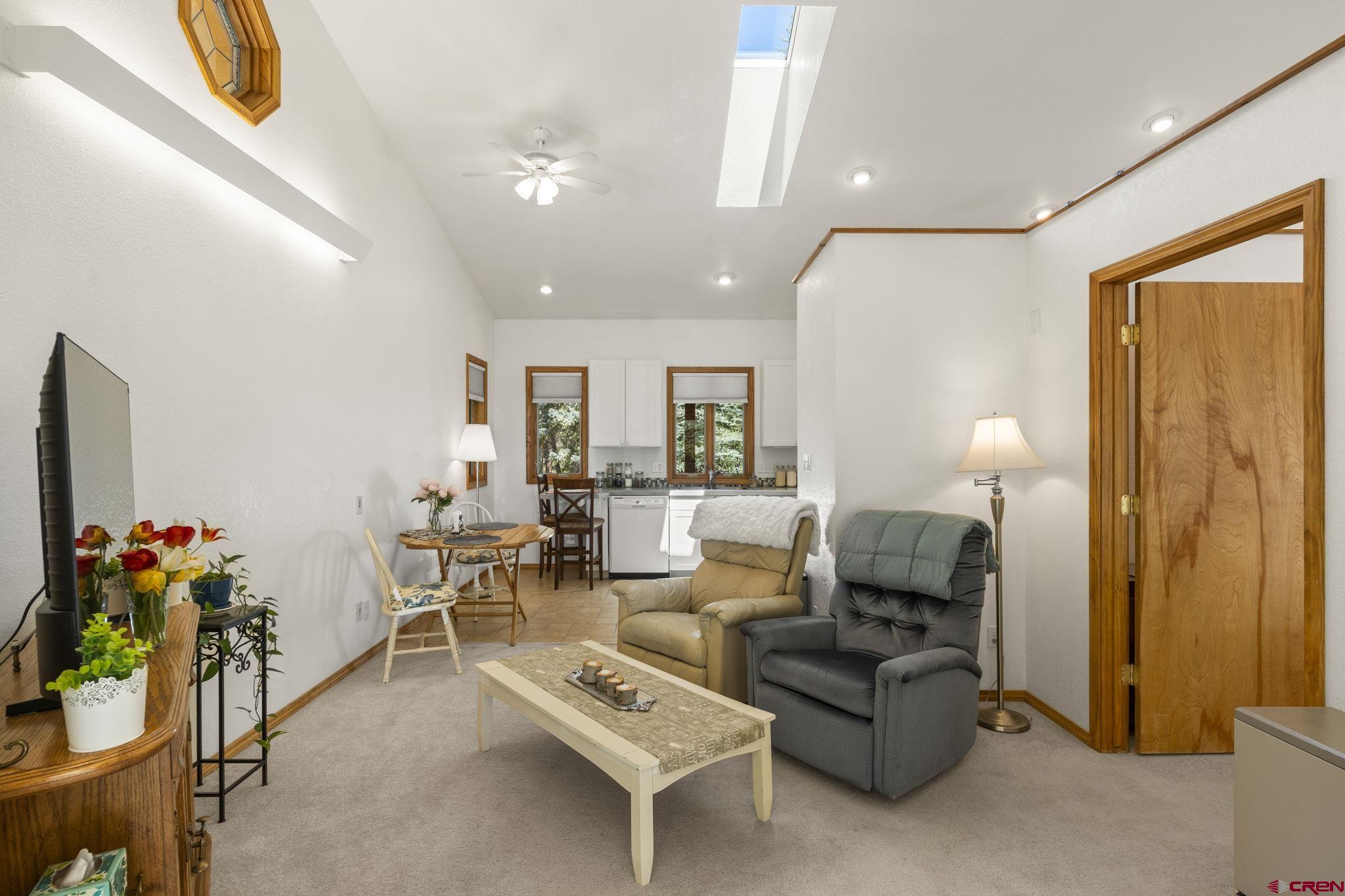37 Verde Lane Durango, CO 81301 - Photo 31 of 45 a living room with furniture and flowers