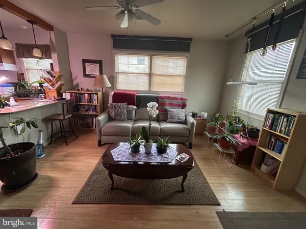 a bedroom with bed and a window