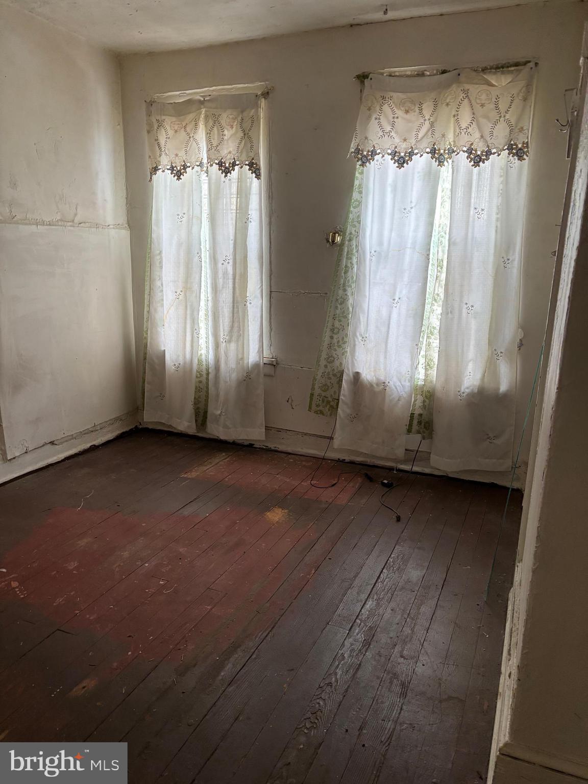 826 State Street Camden, NJ 08102 - Photo 11 of 13 a view of a room with wooden floor and a window