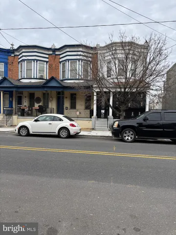 a car parked in front of a building