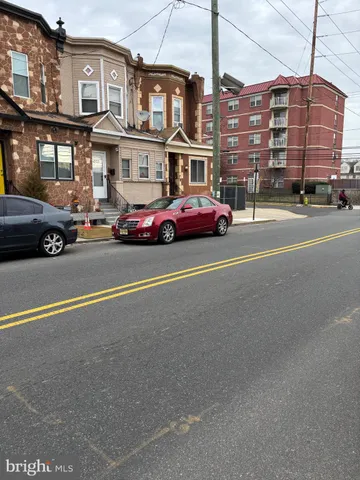 a view of a cars parked in front of a building