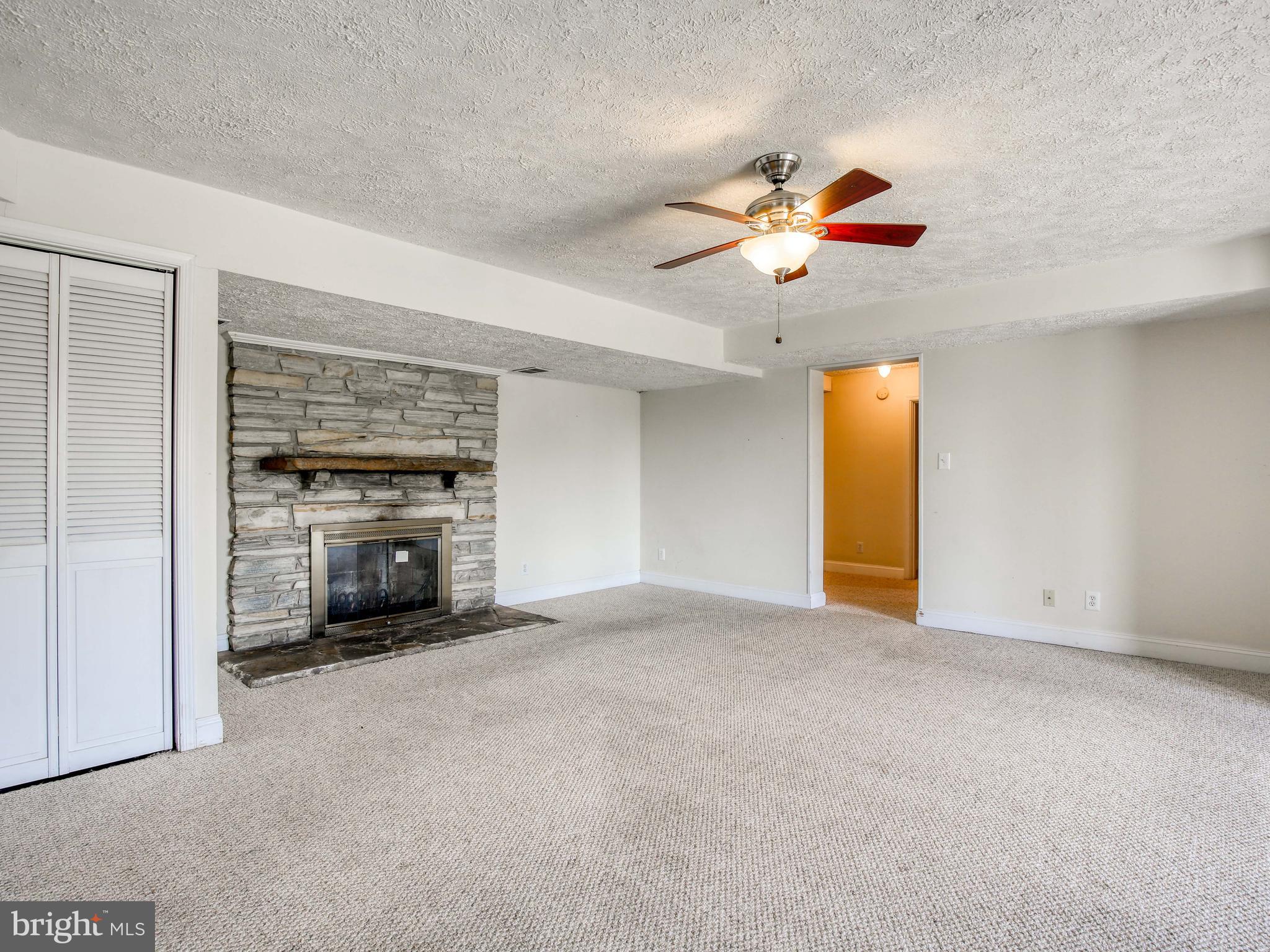 2516 Middle Road Winchester, VA 22601 - Photo 37 of 43 Woodburning fireplace on lower level