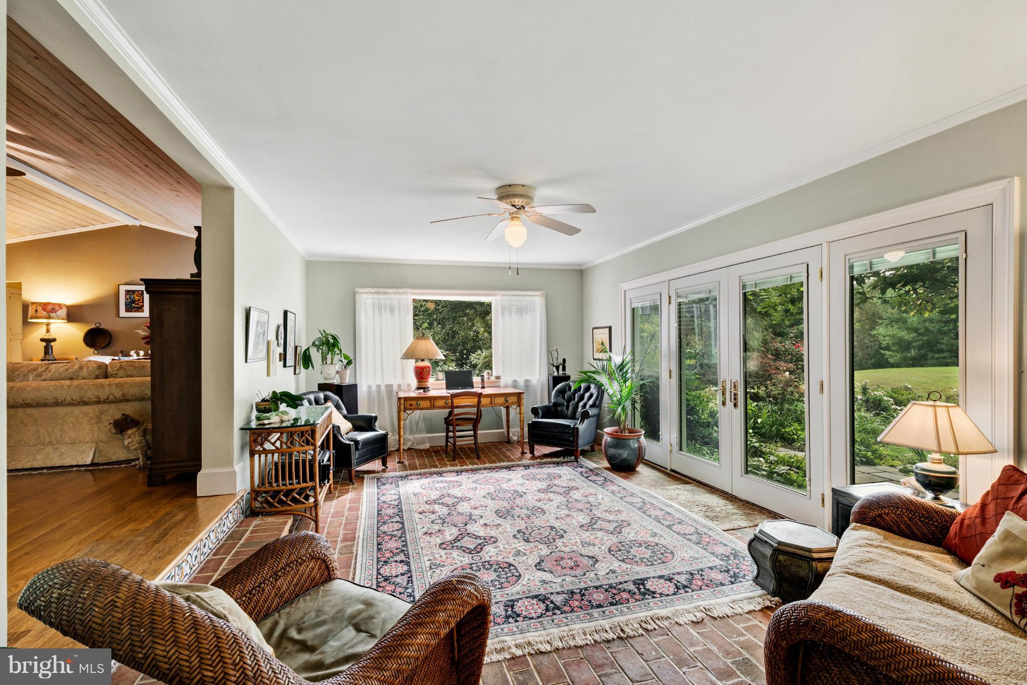 10003 Ada Road Marshall, VA 20115 - Photo 15 of 30 Sunny Sunroom w/Brick Floors overlooks rear yard