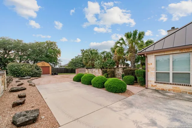 a kitchen that has a sink and a stove in it