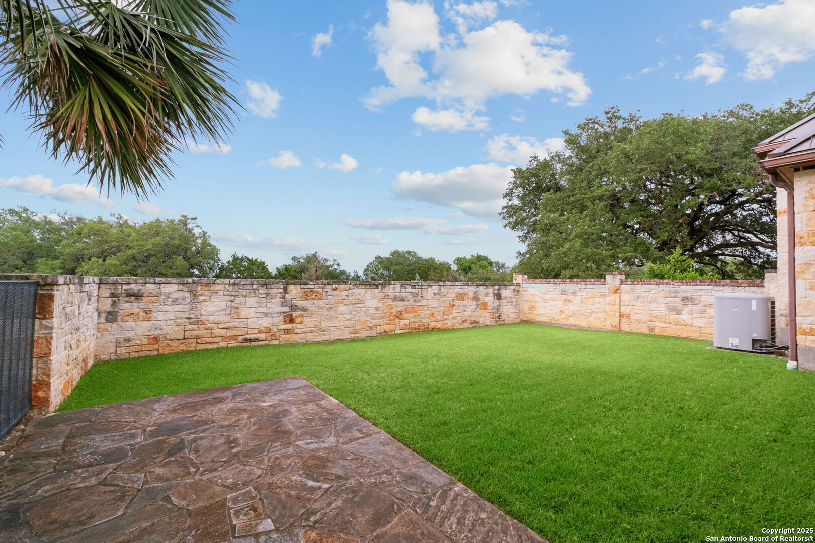 208 Cascade Caverns Road Boerne, TX 78015 - Photo 28 of 74 a view of yard with swimming pool and green space