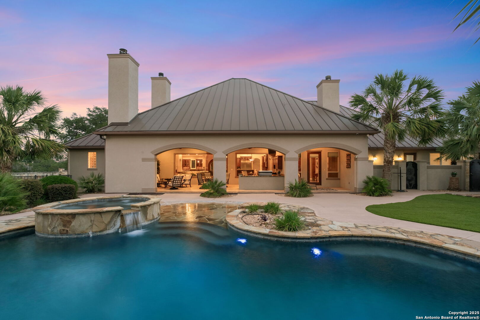 208 Cascade Caverns Road Boerne, TX 78015 - Photo 3 of 74 a front view of house with yard space and lake view