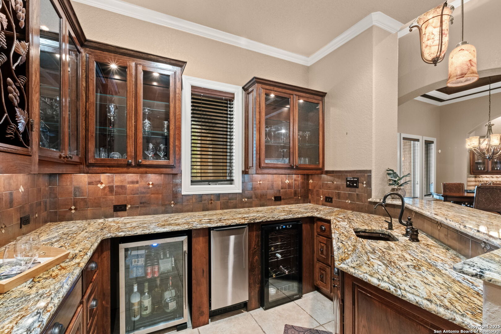 208 Cascade Caverns Road Boerne, TX 78015 - Photo 34 of 74 a kitchen that has a sink and a stove in it