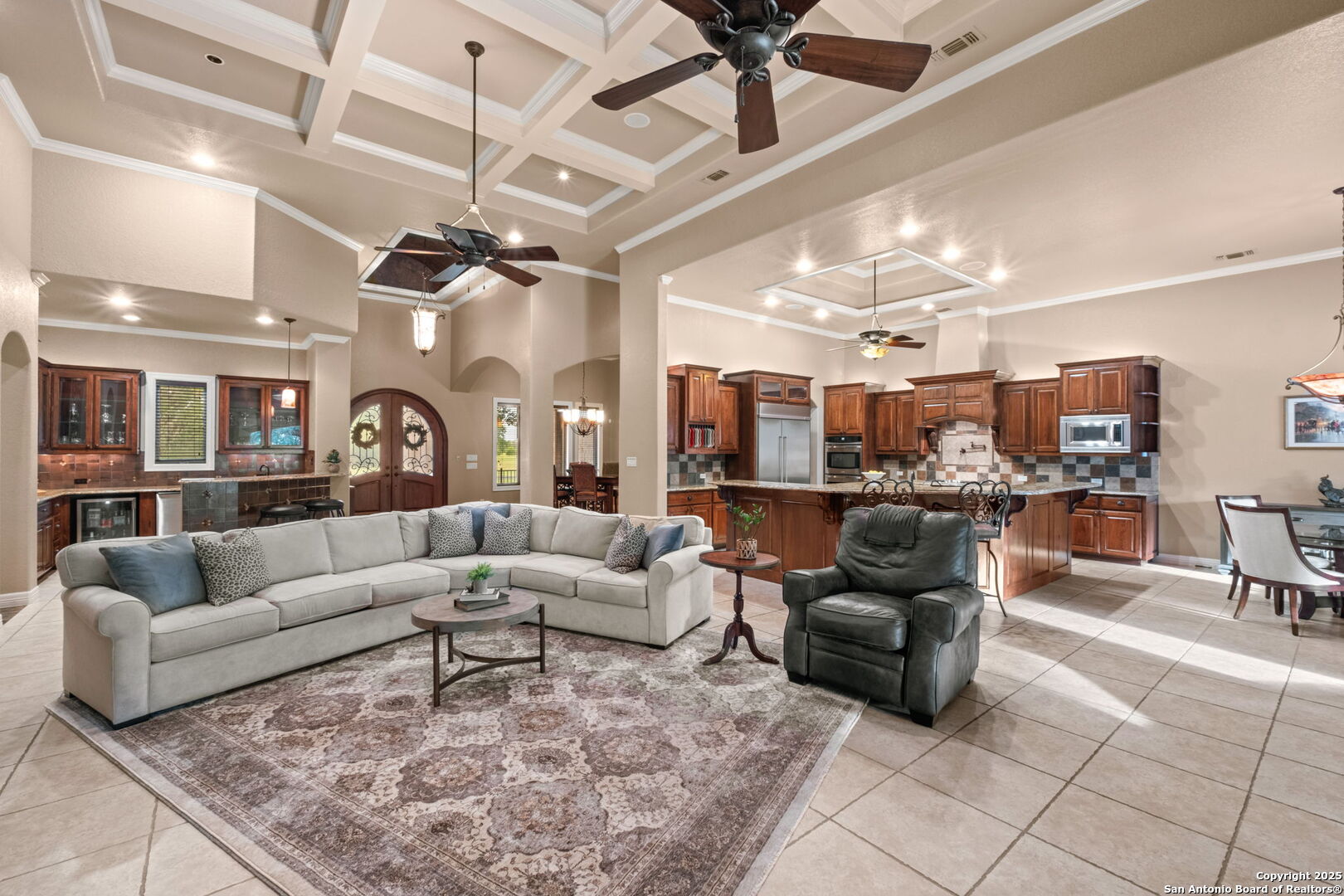 208 Cascade Caverns Road Boerne, TX 78015 - Photo 41 of 74 a living room with lots of furniture and a large window