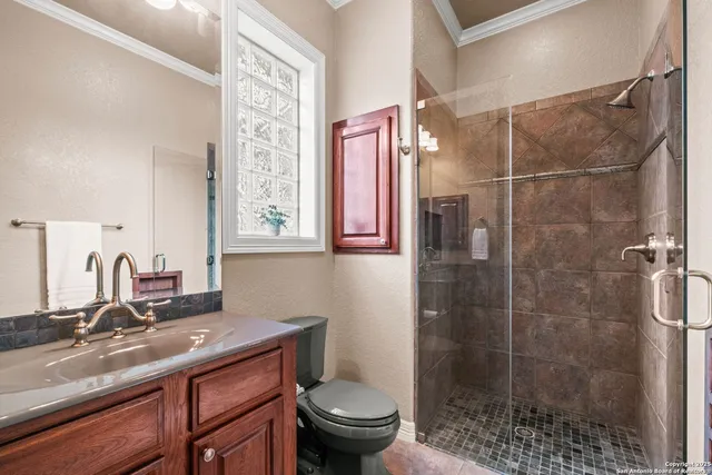 an aerial view of house with yard swimming pool and outdoor seating