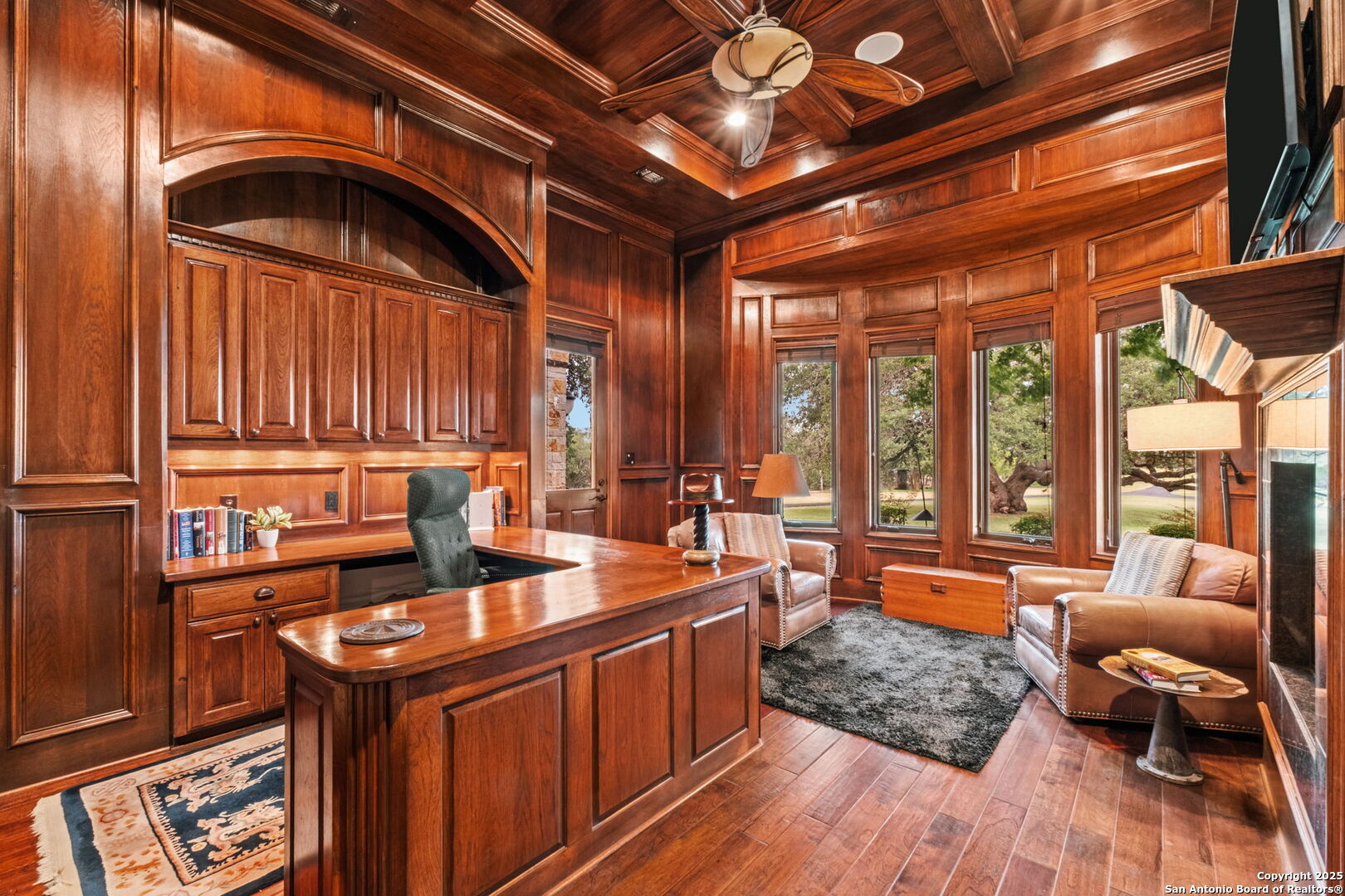 208 Cascade Caverns Road Boerne, TX 78015 - Photo 55 of 74 a kitchen with stainless steel appliances granite countertop a stove a sink and dishwasher wooden cabinets with a granite countertops