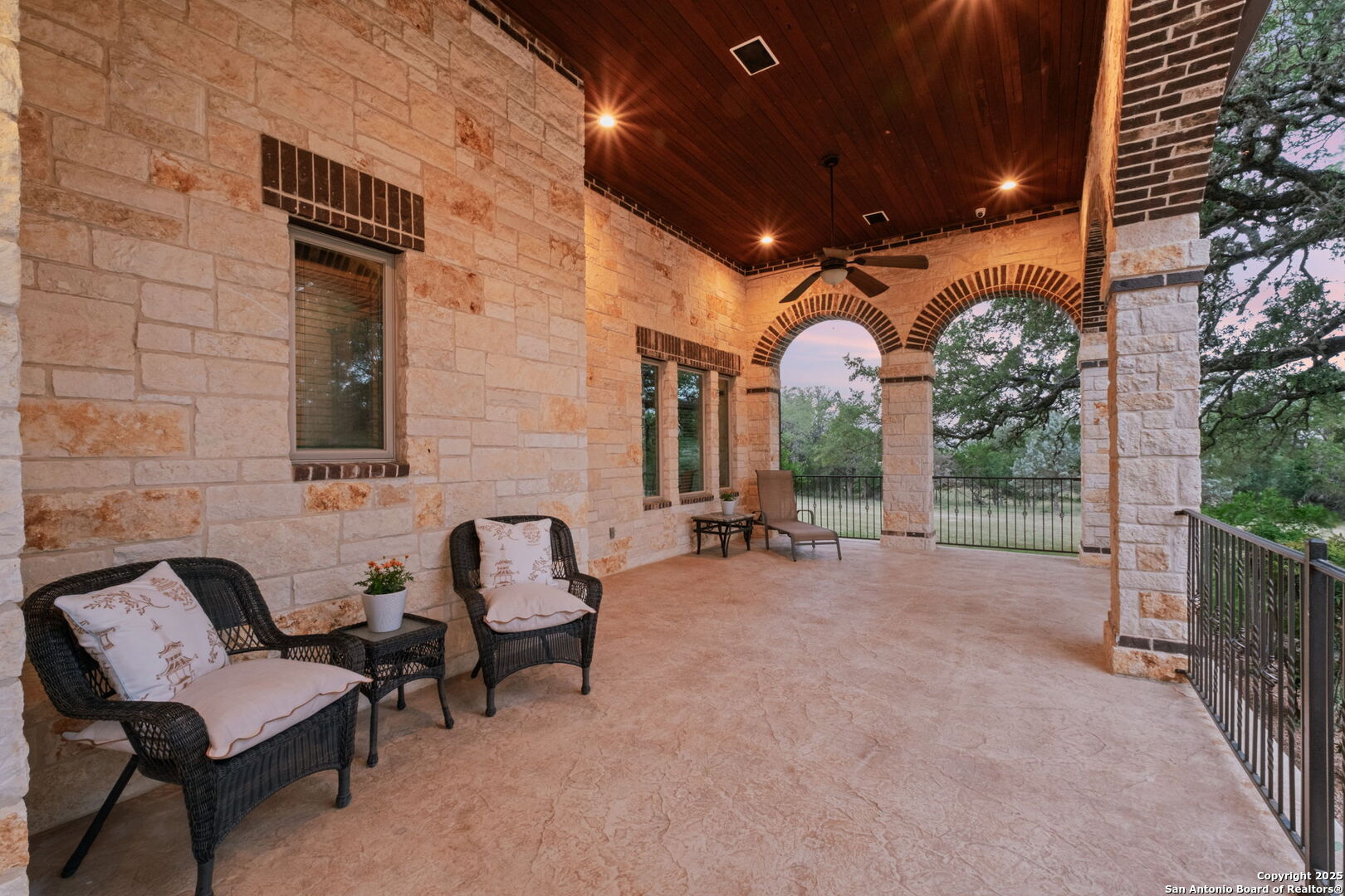 208 Cascade Caverns Road Boerne, TX 78015 - Photo 7 of 74 a view of a house with backyard and sitting area