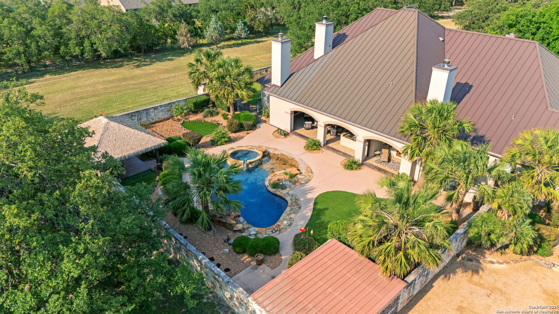 208 Cascade Caverns Road Boerne, TX 78015 - Photo 73 of 74 an aerial view of house with yard swimming pool and outdoor seating