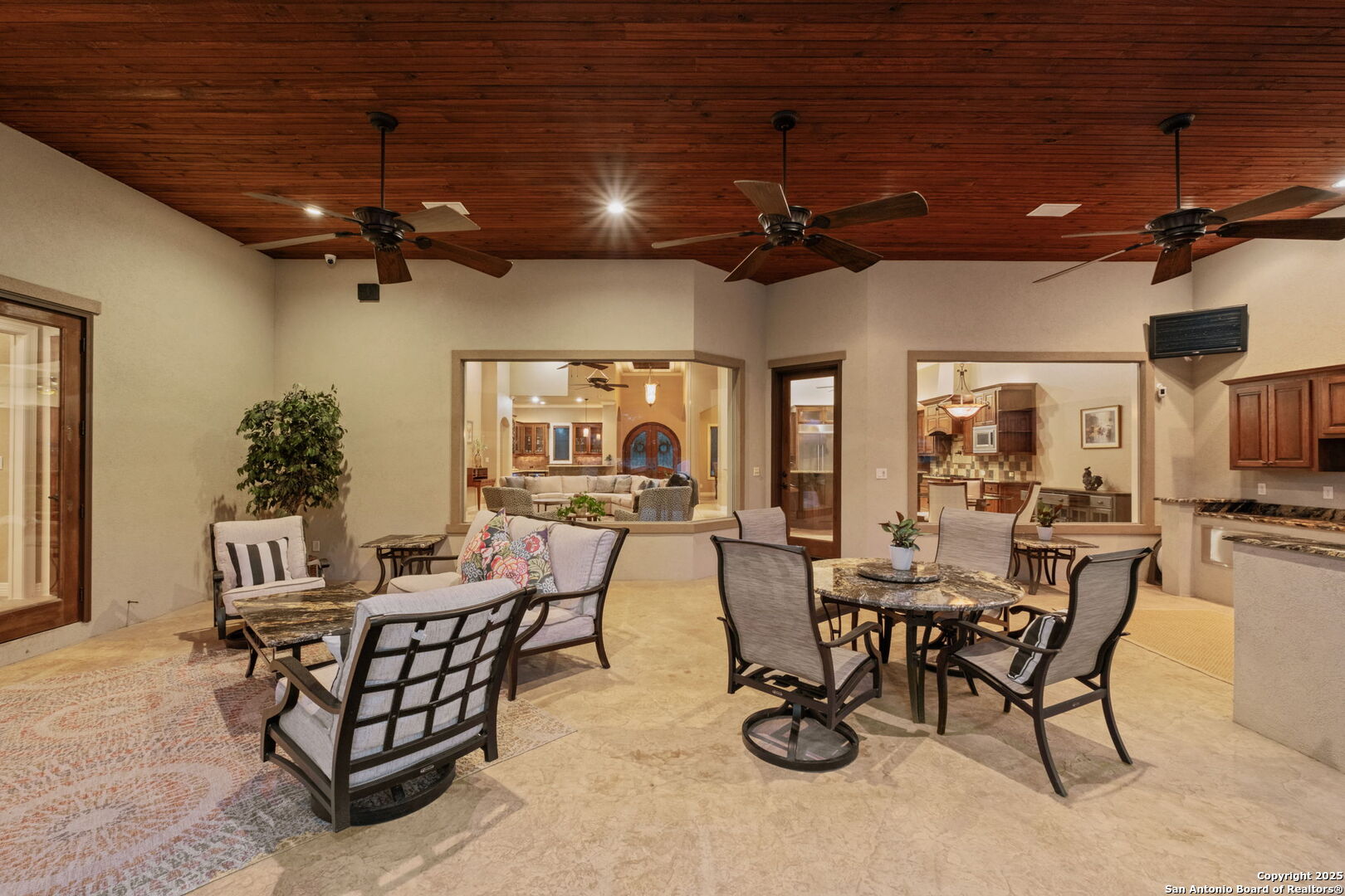 208 Cascade Caverns Road Boerne, TX 78015 - Photo 8 of 74 a view of a dinning room and a livingroom with furniture