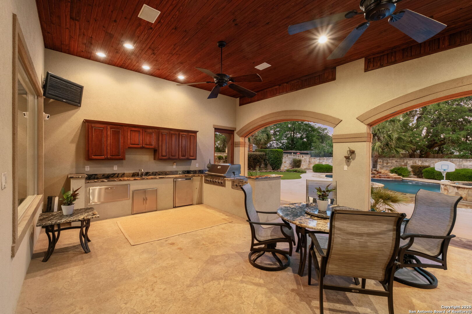 208 Cascade Caverns Road Boerne, TX 78015 - Photo 9 of 74 a view of a dining room with furniture window and outside view