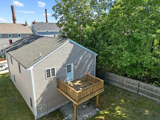 a backyard of a house with lots of green space