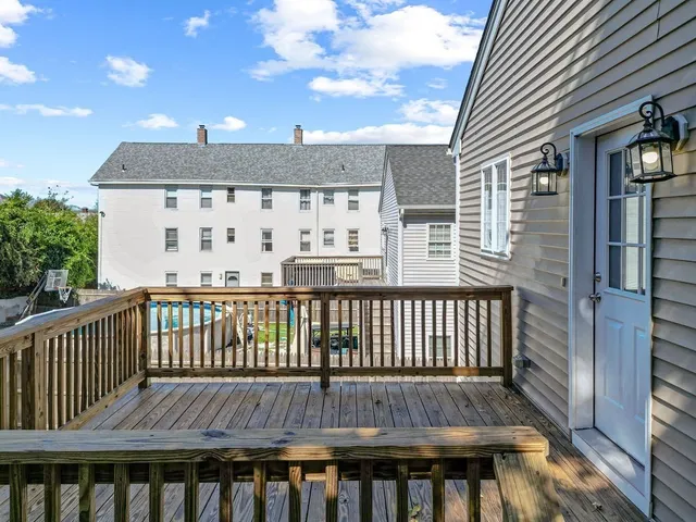 a view of a wooden roof deck