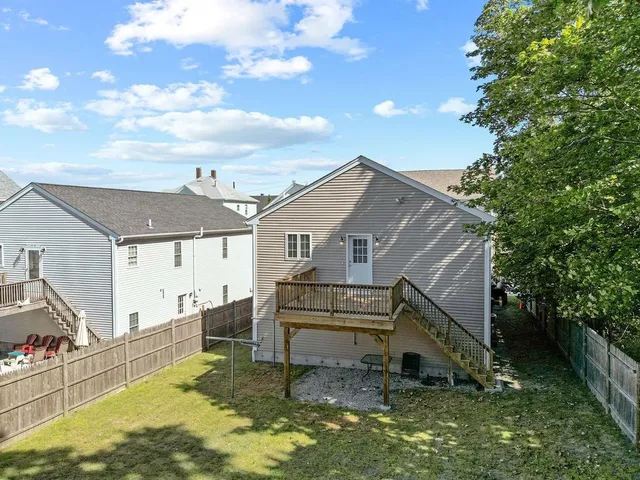 a house view with a backyard space