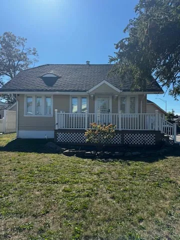a house view with a garden space
