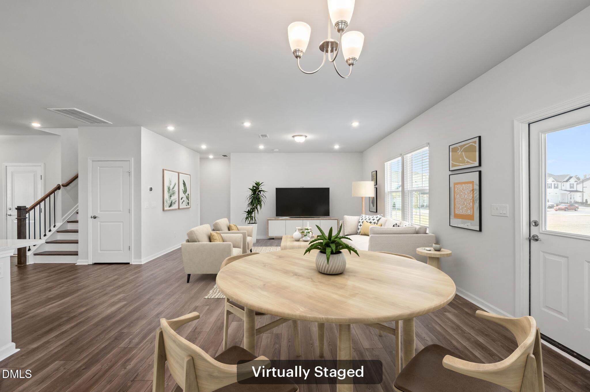 701 Mayfly Way Durham, NC 27703 - Photo 13 of 50 a view of a dining room with furniture