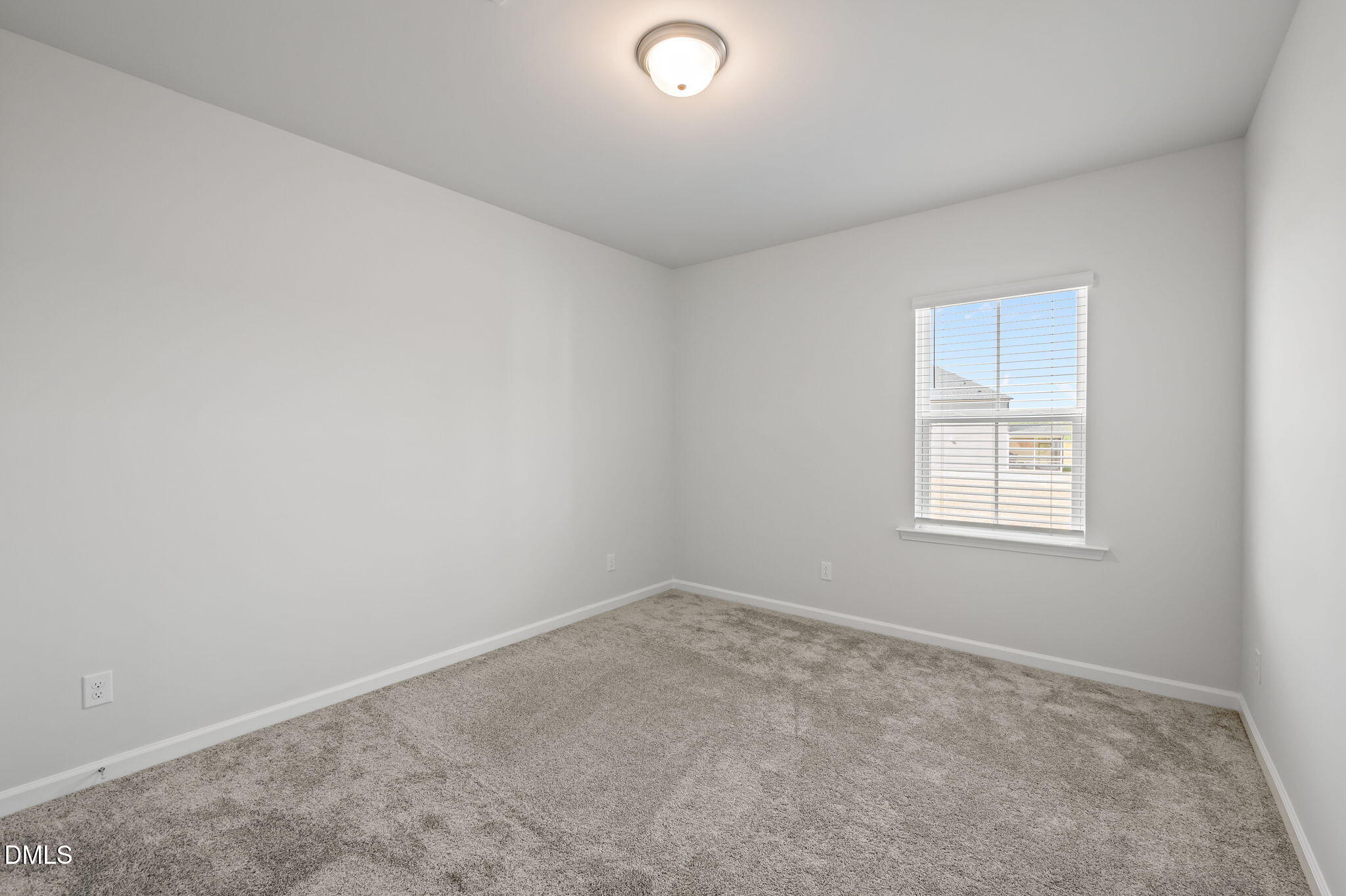 701 Mayfly Way Durham, NC 27703 - Photo 18 of 50 an empty room with a window