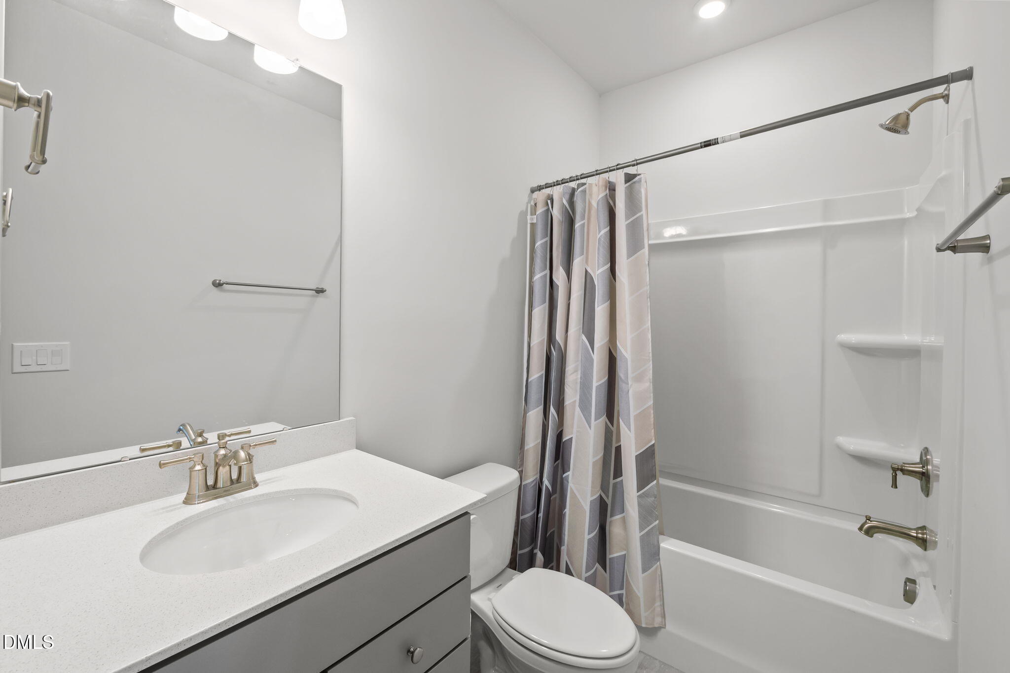 701 Mayfly Way Durham, NC 27703 - Photo 20 of 50 a bathroom with a sink toilet and shower