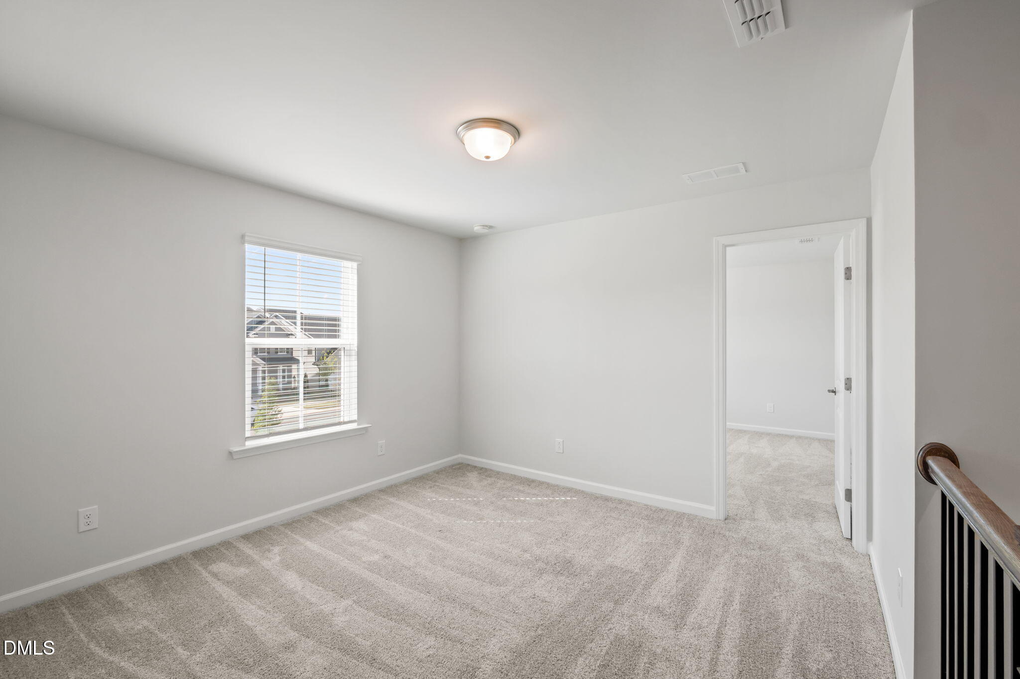 701 Mayfly Way Durham, NC 27703 - Photo 23 of 50 an empty room with a window