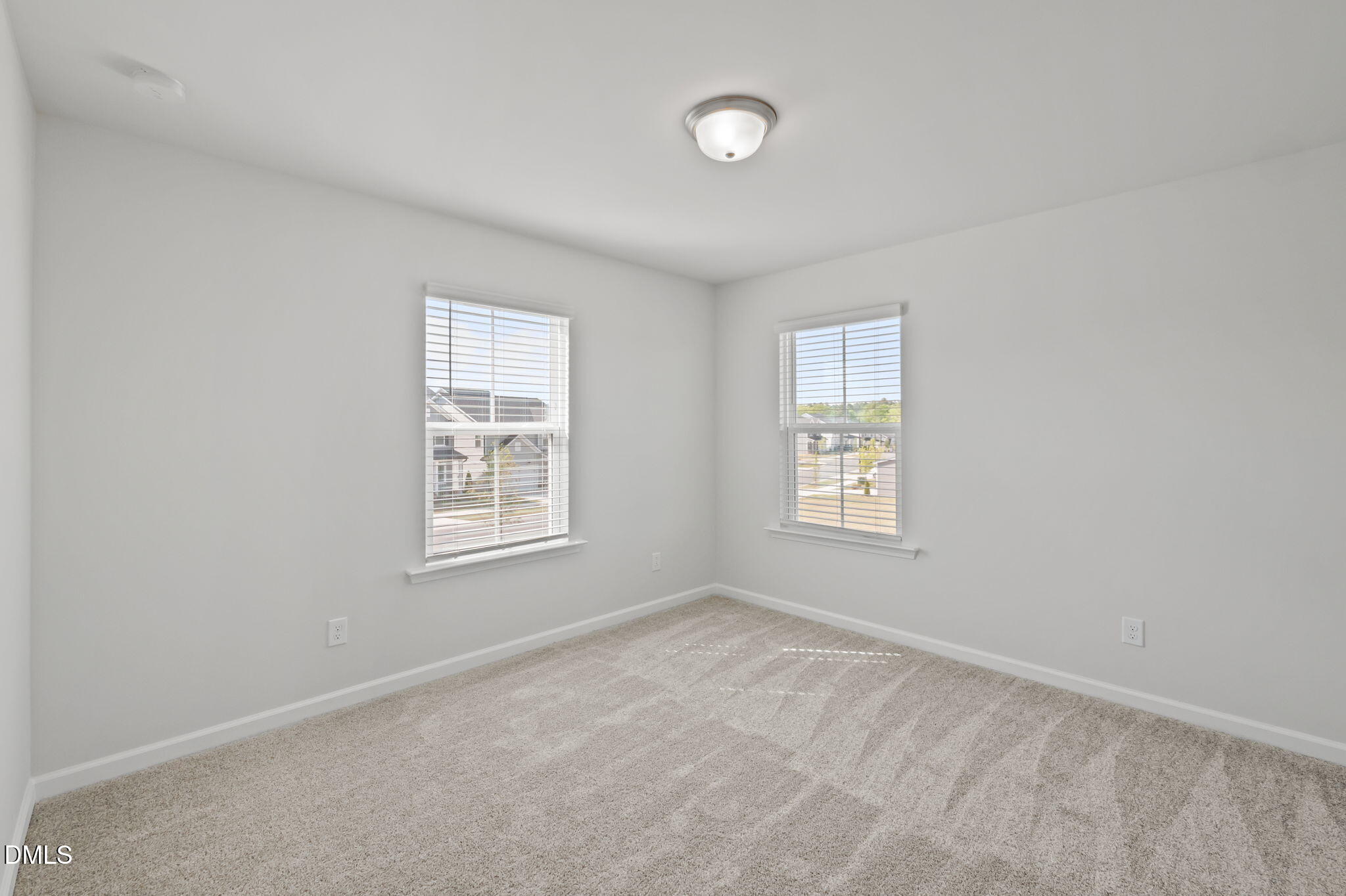 701 Mayfly Way Durham, NC 27703 - Photo 24 of 50 an empty room with windows
