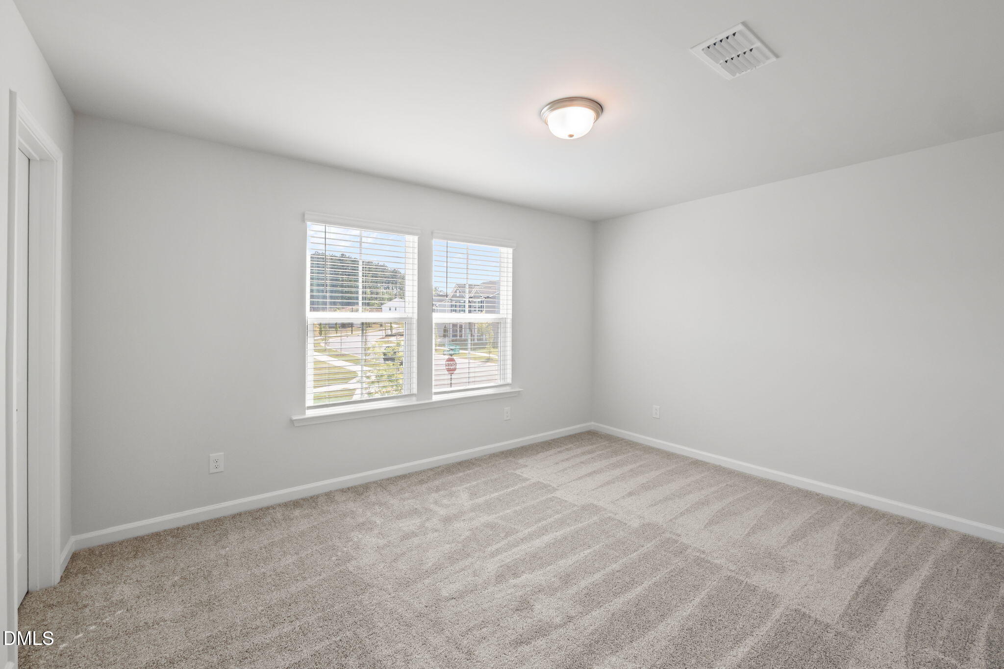 701 Mayfly Way Durham, NC 27703 - Photo 27 of 50 an empty room with a window