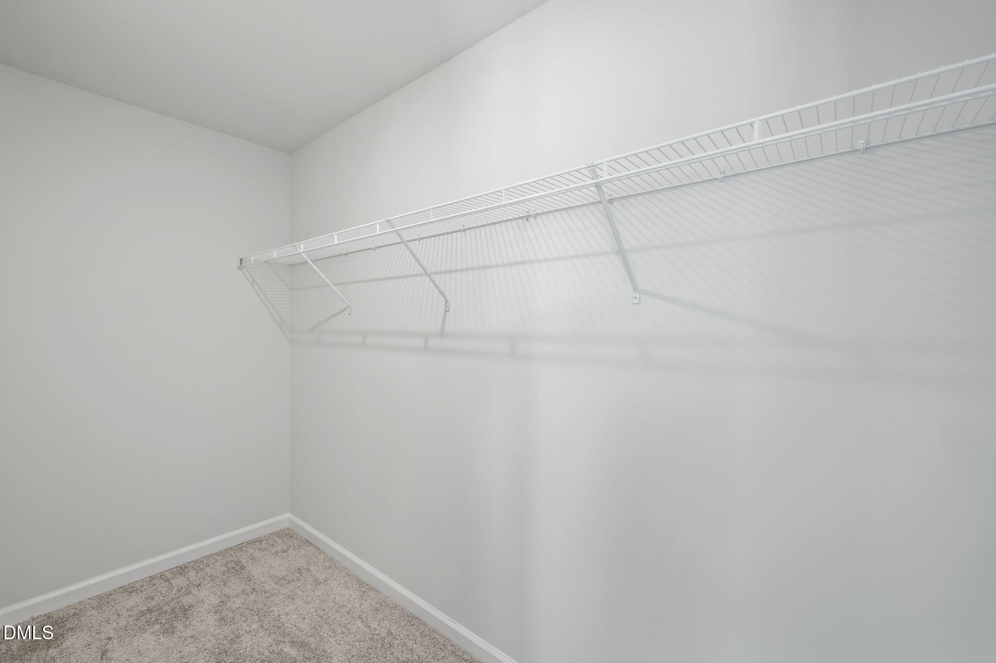 701 Mayfly Way Durham, NC 27703 - Photo 29 of 50 a view of a room with racks on the wall