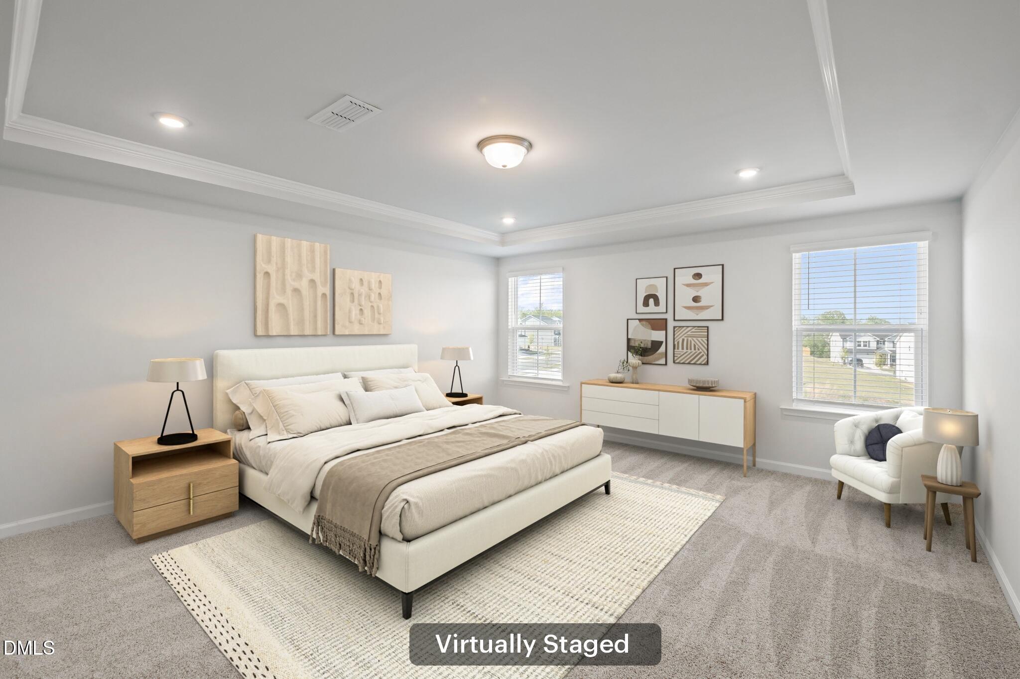 701 Mayfly Way Durham, NC 27703 - Photo 33 of 50 a bedroom with a bed couch and windows